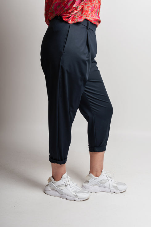 Pantaloni asimmetrici a pieghe Margret